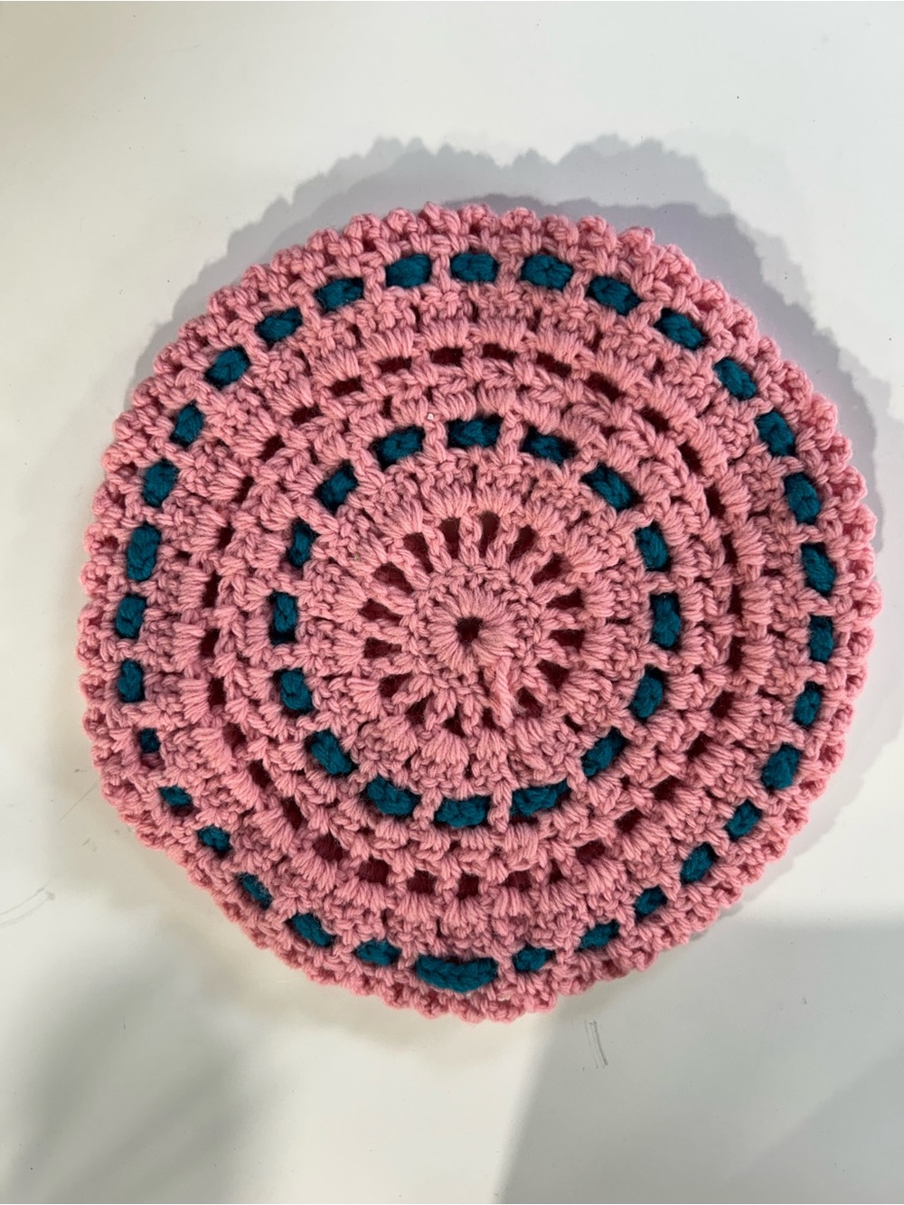 Handmade Pink Crochet Hotpad with Teal Accents